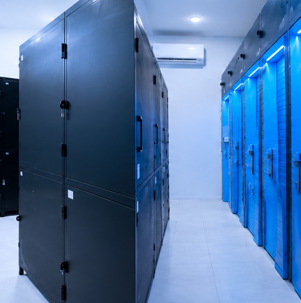 Cool storage units with blue-lit doors and air conditioning at Kuta HQ